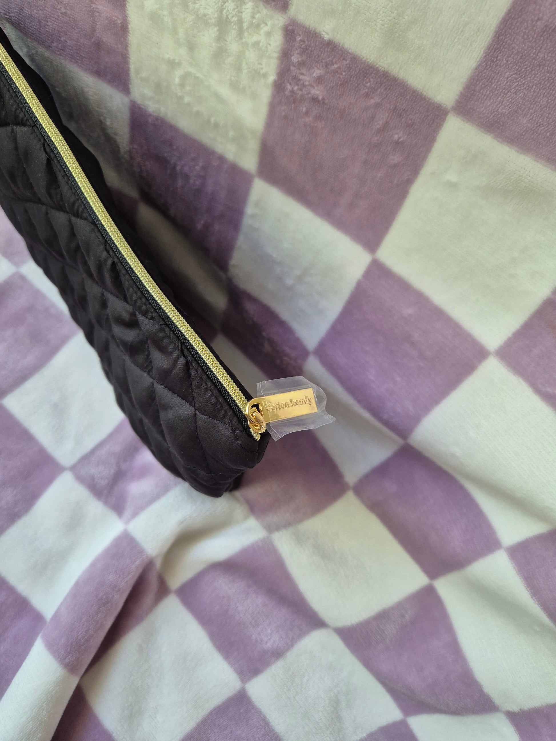Quilted pouch - old label